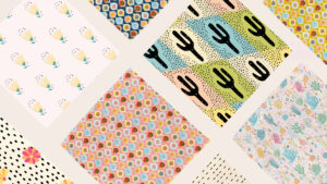 image shows many colorful print on demand bandanas.