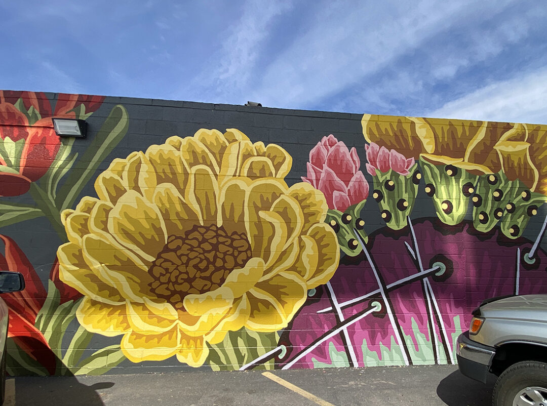 Salt Lake City mural on 2100 South featuring large beautiful cactus flowers.